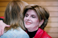 Actress Linda Gray embracing attorney Gloria Allred - by QH