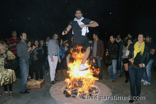 Man jumping over the fire - by QH