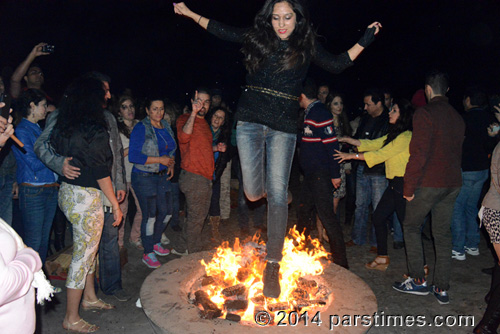 Woman jumping over the fire, LA (March 18, 2014)  - by QH