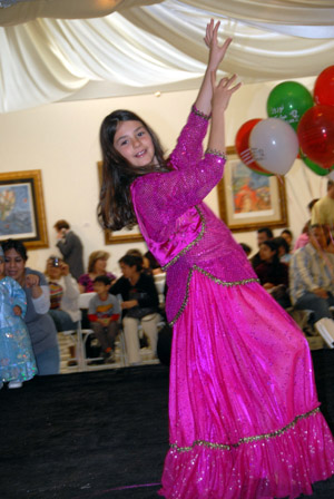 Iranian girl wearing traditional custom dancing