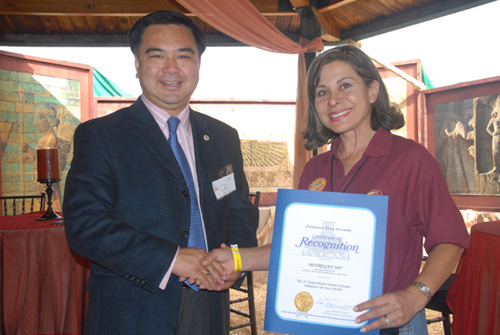 Nora Valenzuela - NIPOC's Director of Public Relations & Assemblyman Van Tran - by QH