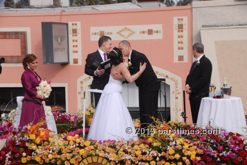 Nicole Angelillo and Gerald Sapienza of Chesapeake, Virginia being married on the parade route - Pasadena (January 1, 2013) - by QH