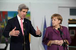 German Chancellor Angela Merkel and U.S. Secretary of State John Kerry in Berlin, February 26, 2013 - USDOS Photo