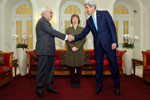 Secretary Kerry shakes hands with Iranian Foreign Minister Zarif as EU High Representative Ashton looks on - USDOS Photo (September 26, 2014)