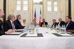 Secretary Kerry Listens as Iranian Foreign Minister Zarif Addresses Reporters Before Meeting in Austria for Latest Round of Nuclear Negotiations - USDOS Photo (June 27, 2015)