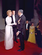 The Shah of Iran, President Nixon, and Mrs. Nixon in formal attire for a state dinner in the White House, 10/21/1969 - ARC Identifier: 194302.