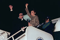 Mohammed Reza Pahlavi, Shah of Iran, and his daughter, Princess Farah, wave goodbye prior to boarding an aircraft after a visit to the United States. -  November 16, 1977, 11/16/1977