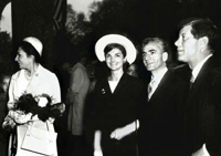 First Lady Jacqueline Kennedy attend a dinner in honor of Mohammad Reza Pahlavi, the Shahanshah of Iran, and his wife, the Empress