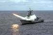 On July 3, 1988, the USS Vincennes (CG 49) shoots down an Iranian passenger jet near the Straits of Hormuz in the Persian Gulf. - US Navy