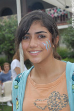Iranian-Amecian youth with a painted face - Santa Anna(July 30, 2006) - by QH