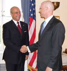 Bijan R. Kian, Ex-Im Bank's newest board member, is congratulated by President and Chairman 
James H. Lambright immediately after being sworn-in during a brief ceremony in the Bank's Washington Headquarters.